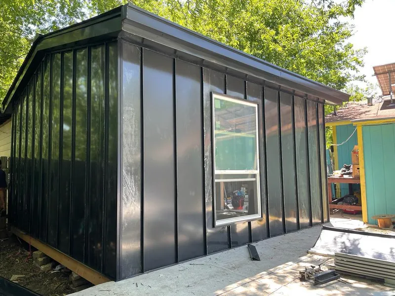 Black standing seam metal wall panels for Roof Inspection in Americus